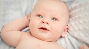 Baby-Boy-On-Blue-Blanket-600X330